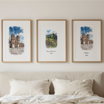 Three framed watercolor art prints depicting Cusco Peru and Machu Picchu are displayed above a bed in a neutral bedroom setting.