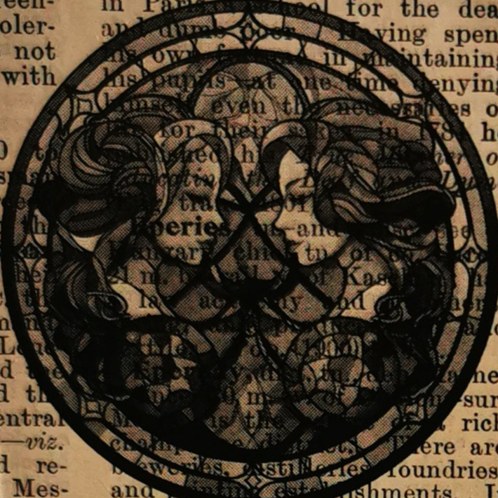 Decorative design of agemini horoscope sign with an original old book page text background.
