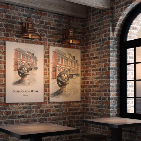 Two vintage-style framed art prints depicting Exeter Custom house, hung on a rustic red brick wall in a cafe or restaurant setting with wooden tables and black-framed windows.