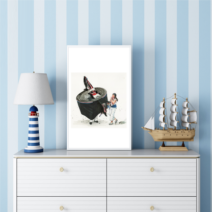 Padstow Blue Obby Oss watercolour travel poster in a frame on a white dresser with striped blue wallpaper