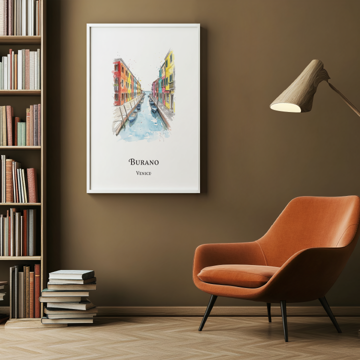 A framed art print of a Venice canal scene labeled 'BURANO Venice' hangs on a brown wall in a modern room setting with a bookshelf, orange armchair, and floor lamp.