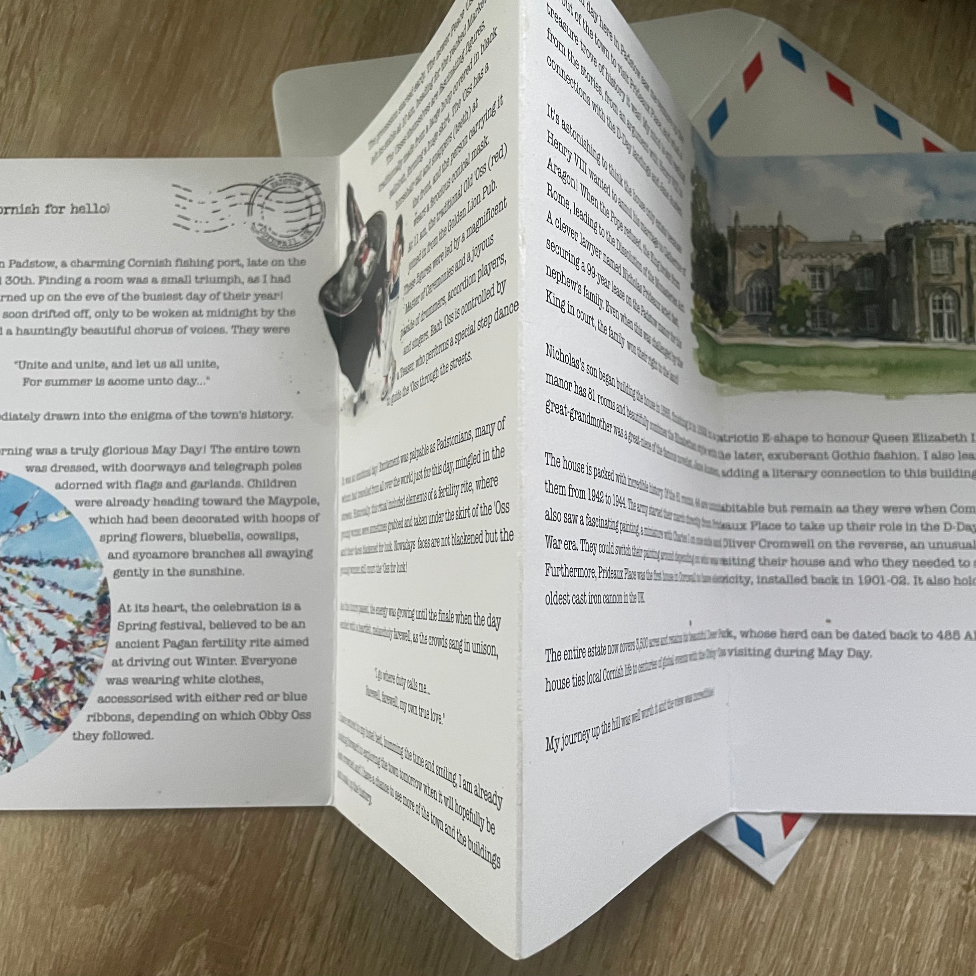Reverse of a5 8 Page Letter home about Padstow with text, watercolour images, and illustrations on a white background with airmail envelope