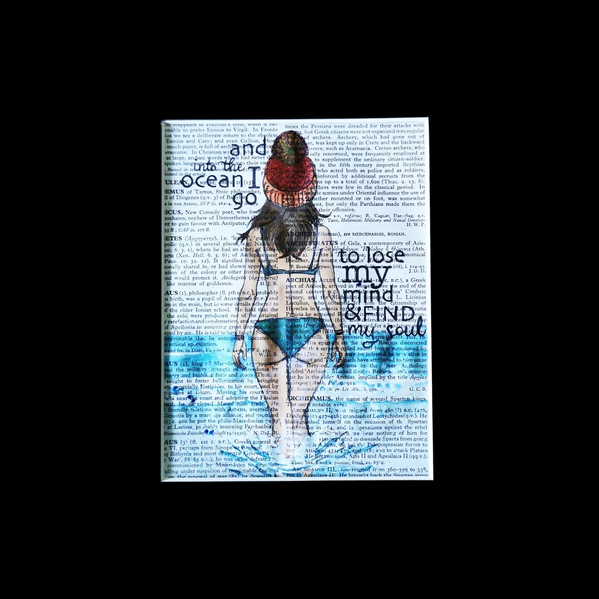 Framed artwork of a woman in a swimsuit with bookpage background.