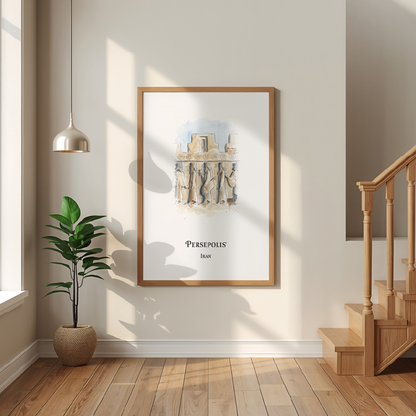 A framed art print featuring an illustration of Persepolis with the text 'PERSEPOLIS Iran' is displayed on a beige wall in a modern interior setting with a wooden staircase, a potted plant, and a hanging light.