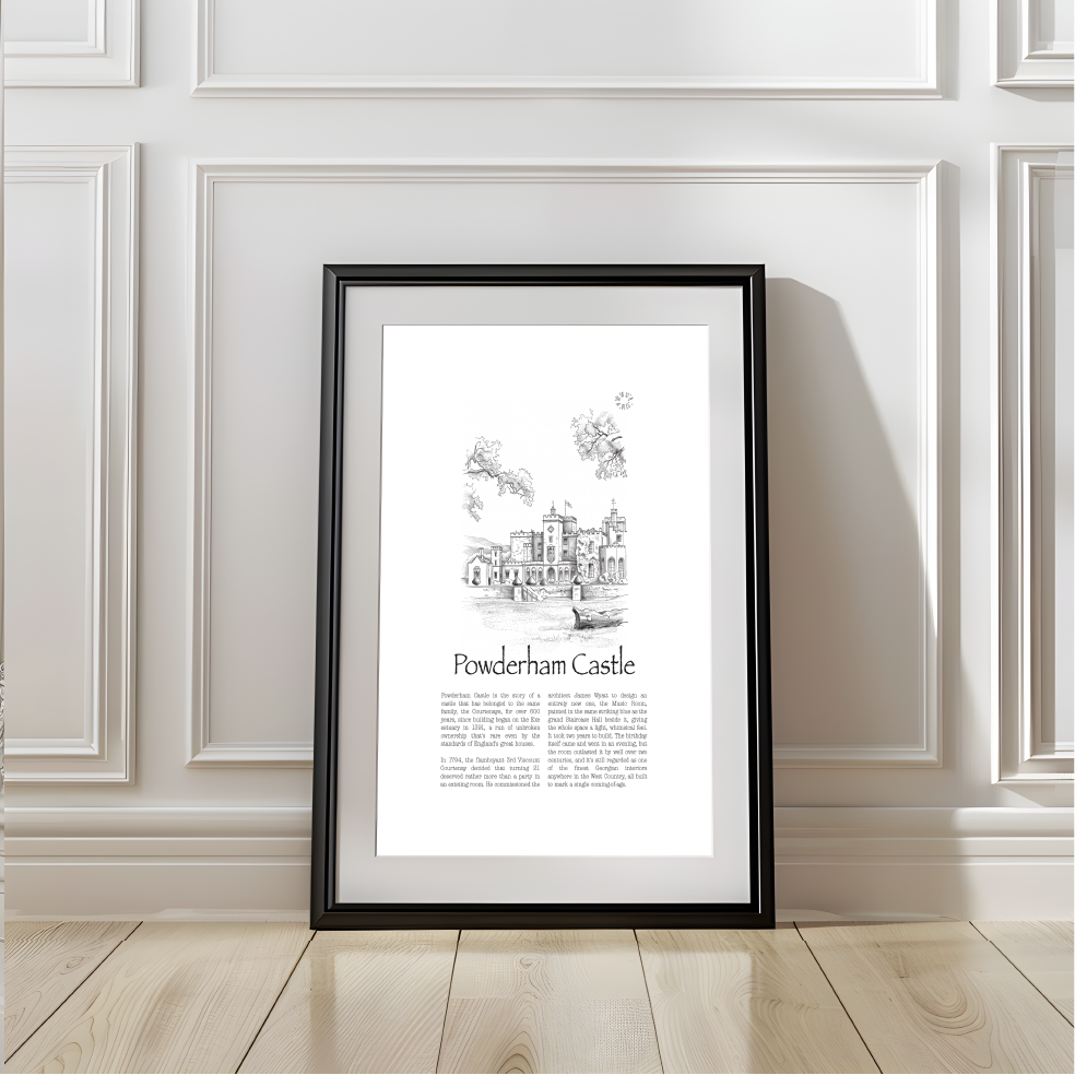 A framed black and white architectural art print of Powderham Castle leaning against a white paneled wall on a light wood floor.