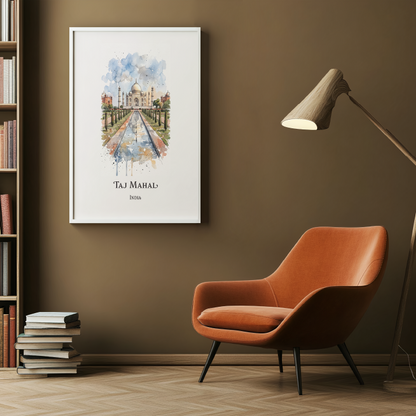 A framed watercolour art print of Taj Mahal hanging on a brown wall in a modern living room setting with an orange armchair, a floor lamp, and a bookshelf.