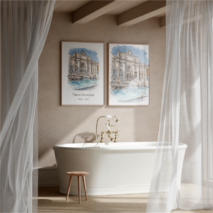 Two framed watercolour prints of Trevi Fountain hang on a beige wall above a white freestanding bathtub in a softly lit bathroom with sheer white curtains and a small wooden stool.
