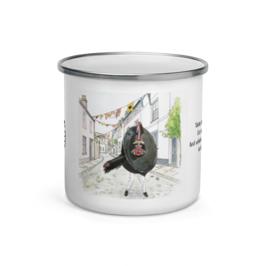 White enamel mug with Red Obby Oss illustration in a Padstow cobbled street